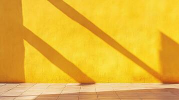 A bright yellow wall with diagonal shadows cast across it, meeting a tiled floor, creating a visually striking and sunny aesthetic. photo