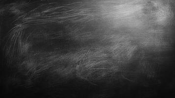 Blackboard surface with residual chalk marks. A dark and somber background with patterns. Could be used as a grungy texture. photo