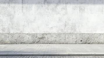 Urban minimalist background featuring a textured concrete wall and a paved walkway, creating a blank canvas for various creative purposes. photo