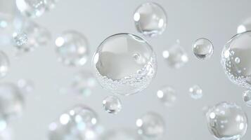 A mesmerizing dance of crystal-clear water bubbles, their fragile forms catching the light in a symphony of purity and ethereal beauty. photo