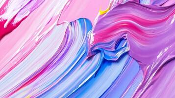 Abstract artwork with vibrant blends of pink, purple, and blue paint strokes creating a visually textured surface. photo