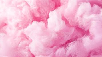 Abstract close-up of fluffy, pink cotton candy creating a soft, dreamy texture. Sweet, airy, and visually appealing. photo