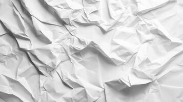 Crumpled white paper creates textured patterns of light and shadow, abstracting the mundane into an artistic display of form. photo