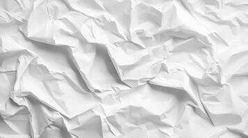 Textured white surface of wrinkled sheet. Detail and abstract of rumpled paper. Use as background, pattern, graphic design element. photo