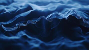 Abstract image featuring layers of dark blue undulating shapes, reminiscent of ocean waves or flowing fabric in an ethereal, dreamlike setting. photo