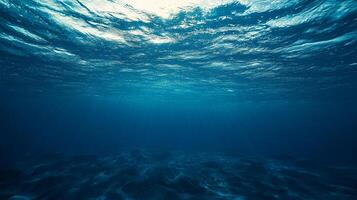 Beneath the surface, an underwater scene with sunlight piercing through the water, creating a serene and captivating blue ambiance. photo