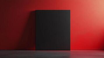 A striking visual of a black canvas against a bold red wall, representing the intersection of simplicity, contrast, and modern artistic expression. photo