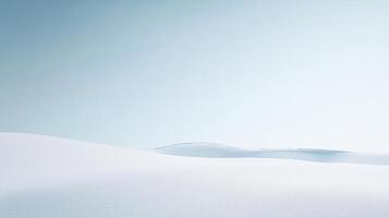 An ethereal landscape featuring smooth, undulating white snow dunes that stretch into the distance, creating a serene and tranquil atmosphere under a soft blue sky. photo