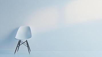The image depicts a minimalist white chair set against a soft blue wall, illustrating a clean aesthetic that resonates with contemporary design and simplicity in function. photo