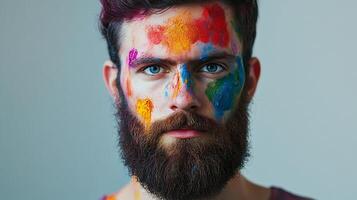 Man with vibrant face paint, a captivating portrait showcasing creativity and self-expression through colorful art. photo