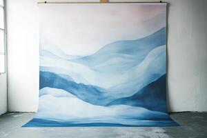 A large, abstract backdrop featuring serene, watercolor-style blue mountain ranges, creating a peaceful and artistic atmosphere. photo