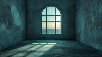 A view of the ocean shines through an arched window in a stone room. The light casts shadows on the floor, contrasting the weathered walls. photo