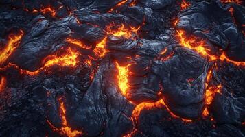 Molten rock flowing into cracks of solidified lava. Extreme heat and texture are captured from a top-down view. photo