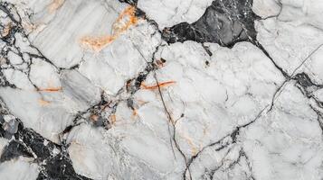 Close-up shot of a textured surface. Black and white marble with orange and gray veining creates a dynamic and visually stunning pattern. photo