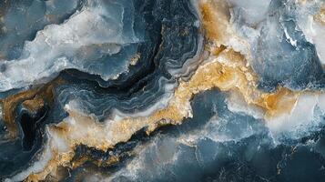 Dramatic swirl of blues, whites, and gold creates an abstract landscape, full of depth and texture, reminiscent of geological formations. photo