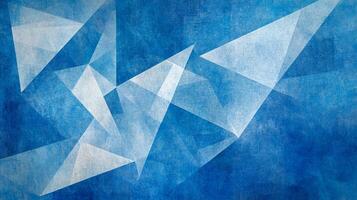 Abstract geometric design in varying blue hues, featuring sharp triangular shapes with a textured, painterly effect. Modern and evocative. photo