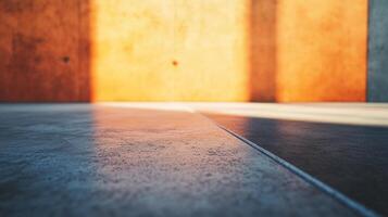 Warm sunlight on textured floor and wall. Abstract, minimalist scene with neutral colors and subtle shadows. Tranquil, inviting space. photo