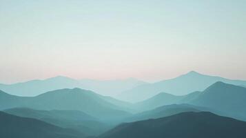 Serene mountain range fading into the horizon, soft blue hues create a tranquil, dreamlike atmosphere. Majestic and calming landscape. photo