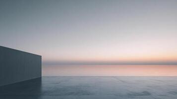 Minimalist seaside scene with a concrete platform and wall facing a calm ocean under a pastel sunset sky, evoking serenity and tranquility. photo