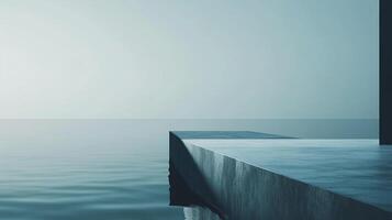 Minimalist seascape featuring a concrete platform extending over calm waters under a serene, muted sky. Evokes peace and tranquility. photo