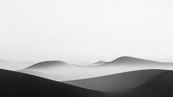 Monochrome dunes create a stark contrast between light and shadow, showcasing their smooth, undulating forms in a minimalist landscape. photo