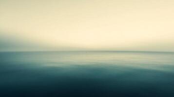 Expansive seascape with a serene blue ocean under a soft, diffused sky evoking tranquility and reflection. Calmness, horizon. photo