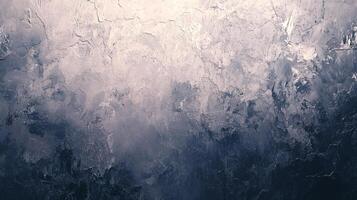 Abstract texture featuring a gradient from pale white at the top to deep navy at the bottom, suggesting depth or the sea. photo