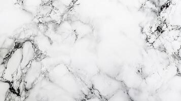 A high-resolution close-up captures the abstract beauty of white marble, with intricate grey and black veining creating a unique pattern. photo