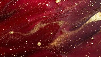 Vibrant, textured background with a blend of dark red and gold glitter, creating a luxurious and festive visual experience. photo