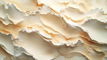 Abstract cream patterns resemble layers of rock formations with soft, pastel color gradients creating visual depth and texture. photo