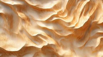 Abstract sand dunes in a desert landscape create a textured and wavy surface, showcasing natural desert formations. photo