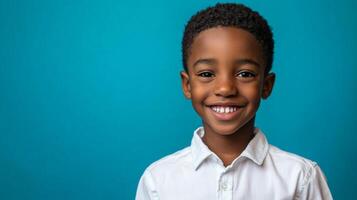 Portrait of a cheerful young boy with a brilliant smile against a solid background radiating joy and innocence, creating a captivating image. photo
