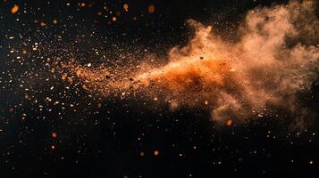 Exploding color against darkness. Particles scatter and burst in a vibrant display, creating an exciting contrast against the stark background. photo