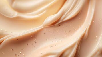 Luxurious close-up of light beige cream. The texture is smooth, rich and moisturizing. It looks like a high end skin care product. photo