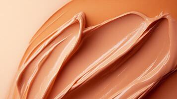 Swatches of foundation create a smooth, even skin tone. This provides full coverage for a flawless look for beauty enthusiasts. photo