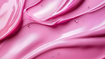 Abstract composition of smooth, swirled pink substance with tiny, clear droplets scattered across the surface, reflecting light. photo