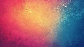 Textured vibrant gradient with blended hues of pink, orange, yellow, and blue creating a dynamic colorful effect on a grainy surface. photo