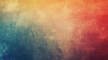 Abstract vibrant gradient texture with blue, orange, and red blending seamlessly in a worn, aged effect, creating a unique and captivating visual. photo