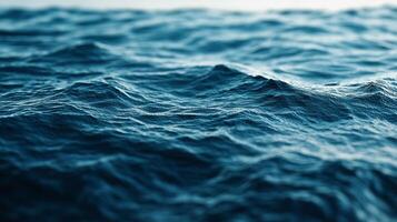 A mesmerizing view of ocean waves displaying nature's raw power. The water surface is a captivating expanse of blue, and tranquility. photo
