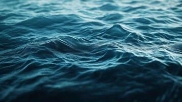 A mesmerizing view of the ocean surface, showcasing gentle waves and deep blue hues, inviting a sense of tranquility and vastness. photo