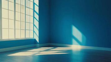 Sunlight streams through a large window into an empty room, creating a bright and inviting atmosphere, highlighting the textures and colors. photo