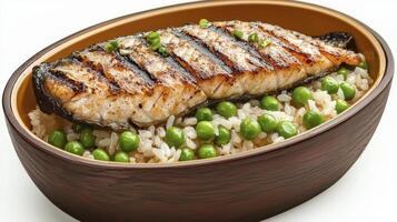 Delicious Grilled Fish Recipe Savor the Flavors of the Sea with Tender Flaky White Fish Fillet, Expertly Grilled and Served Atop a Bed of Rice and Fresh Green Peas, a Healthy and Nutritious Dish photo