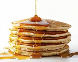 Delicious Stack of Pancakes with Dripping Maple Syrup A Culinary Delight for Breakfast, Brunch, or Dessert Enjoy the Fluffy Texture and Sweet Taste of Homemade Pancakes, Perfect for a Weekend Treat photo