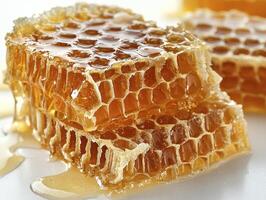 Golden Honeycomb Delight A Close-Up View of Nature's Sweetest Creation, Showcasing the Intricate Geometric Patterns and the Rich, Amber Hue of Pure Honey, Emphasizing its Natural Beauty and the photo