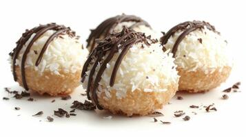 Indulge in the delightful sweetness of these homemade coconut macaroons, a classic confectionery treat perfect for any occasion These delicious coconut macaroons, drizzled with rich dark chocolate photo