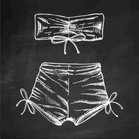 Sketch of two-piece beachwear set with bandeau top and tied shorts in monochrome vintage style on chalkboard background vector