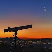 telescope on tripod is silhouetted against colorful sunset sky with stars and crescent moon photo