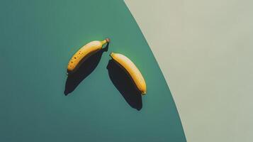 Fresh bananas on flat green and blue background, creating vibrant contrast photo