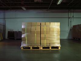 Stacked boxes on pallets in industrial warehouse setting, showcasing organized storage and efficient logistics photo