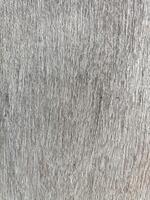 Textured surface with metallic sheen, showcasing intricate patterns and lines. Ideal for backgrounds or design elements photo